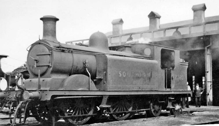 Ex-LBSCR auto-fitted 0-4-4T at Ashford Locomotive Depot 
7th July 1946
Ex-LBSCR R. Billinton class D3/M no.2380 was built July 1893 and withdrawn April 1953. Ashford had a number of these for working on local branch services and they proved very unlucky with attacks by enemy aircraft during World War II (although not this particular engine).
© Ben Brooksbank (CC-by-SA/2.0)
