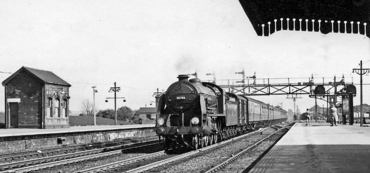 Up Continental Boat express passing Ashford
20th April 1957
The locomotive is SR Maunsell N15 'King Arthur' class no.30766 'Sir Geraint' (built May 1925, withdrawn December 1958)..
© Ben Brooksbank (CC-by-SA/2.0)
