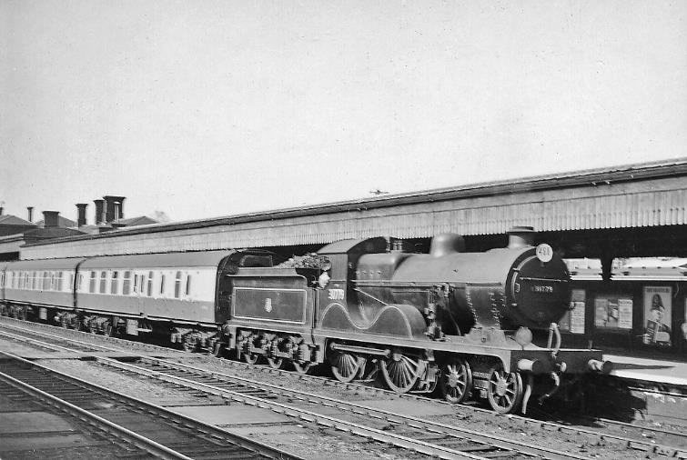 Train from Maidstone East at Ashford
20th April 1957
A typical stopping train, the 2.24pm from Maidstone East is standing at the Down main platform, headed by ex-SE&CR L class. Designed by Wainwright but built in Germany by Borsig in July 1914 - just before World War One, lasting until July 1959.
© Ben Brooksbank (CC-by-SA/2.0)
