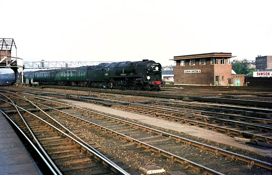 Bournemouth line train passing Clapham Junction B signal box
26th April 1966
Clapham Junction B signal box still exists although no longer in use. It was built by British Railways in 1952, but the style is very much derived from its Southern Railways predecessors. It closed in 1980 but was subsequently used as a permanent way mess room.
Alan Murray-Rust (CC-by-SA/2.0)