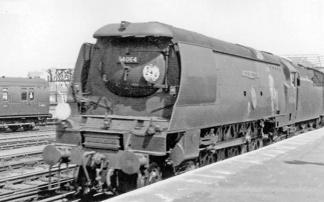 Bulleid Light Pacific passing Clapham Junction on a Weymouth express 
30th April 1966
Passing through platform 9, the 12.35am Waterloo - Weymouth is headed by 'Battle of Britain' no.34064 'Fighter Command', built July 1947 as no.21C164, not rebuilt, withdrawn May 1966 and scrapped. 
“This must have been one of its very last workings”.
© Ben Brooksbank (CC-by-SA/2.0)
