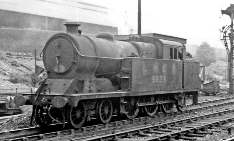 BloodandCustard
Marylebone Station
Suburban Services
18th July 1947
In the yard outside Marylebone, terminus of the ex-Great Central lines. Robinson Class A5/1 no.9828 was one of a fleet of engines employed on the suburban services from Marylebone to High Wycombe, Princes Risborough and Aylesbury in the 1920's - 1950's. Structure on the right is a mechanical ash-plant and on the left is a turntable, provided to save the engines on duty returning out to their home depot at Neasden.
© Ben Brooksbank (CC-by-SA/2.0)
