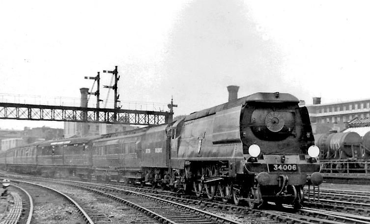 BloodandCustard
Marylebone Station
8.25am from Manchester
9th June 1948
During the 1948 Exchange Trials 'West Country' no.34006 'Bude' with its long smoke deflectors (built July 1945 as 21C106, withdrawn March 1967), fitted temporarily with an LMS tender with water-scoop, arrives at Marylebone heading the 08.25 from Manchester (London Road) via Sheffield, on trial with dynamometer-car.
  Ben Brooksbank (CC-by-SA/2.0)