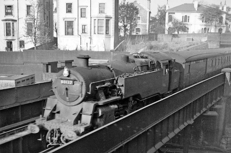 BloodandCustard
Marylebone
South Hampstead
1st November 1958
Headed by BR Standard no.80137 this Up local train into Marylebone crossing the main line into Euston is probably from Princes Risborough and High Wycombe. 
“This might have been a good spot for watching trains, with the main lines from Euston underneath, but there was nowhere to sit.”
© Ben Brooksbank (CC-by-SA/2.0)
