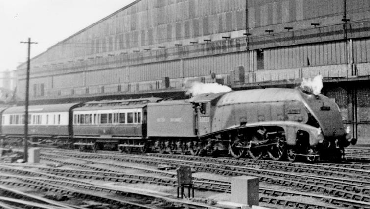BloodandCustard
Paddington Station
1948 Locomotive Exchanges
LNER Pacific entering Paddington
7th May 1948
Passing Paddington Goods station, Gresley A4 Pacific no.60033 'Seagull' whistles as it arrives at Paddington on the 8.30am express from Plymouth with the dynamometer-car leading - an extraordinary sight at the time.
© Ben Brooksbank (CC-by-SA/2.0)
