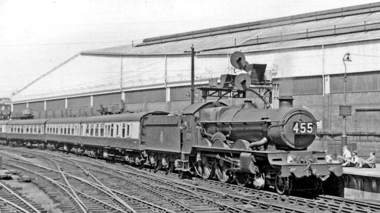 BloodandCustard
Paddington Station
Express from Weston-super-Mare enters Paddington
25th July 1953
From the end of Platforms 6/7 'Castle' no.4084 'Aberystwyth Castle' (built May 1925, withdrawn October 1960) brings the 8.20am from Weston-super-Mare into Platform 8 - past a bevy of young spotters languishing on the platform. Beyond the electrified Hammersmith & City lines is the great bulk of Paddington Goods.
 This scene seemed at the time to be everlasting. 
  Ben Brooksbank (CC-by-SA/2.0)