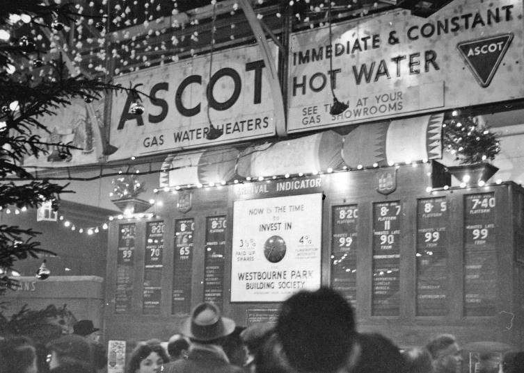 BloodandCustard
Paddington Station
Paddington Station arrivals board at Christmas 
21st December 1956
 On the Friday evening (21 December) there was a terrible fog and the board indicators could not show lateness of more than two digits (99 minutes)! 
  Ben Brooksbank (CC-by-SA/2.0)