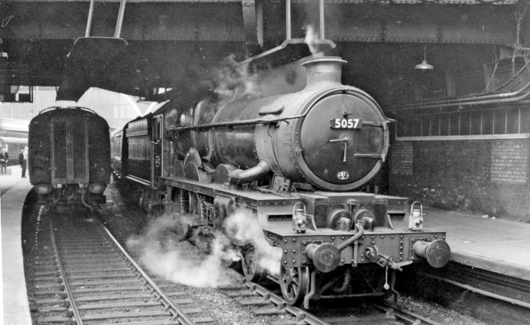 BloodandCustard
Paddington Station
Express at Paddington about to leave for Devon
20th July 1963
Towards the buffer-stops from under Bishops Road Bridge; 'Castle' no.5057 'Earl Waldegrave' (built June 1936 as 'Penrice Castle', renamed October 1937, recently fitted with double-chimney, withdrawn March 1964) is heading the 10.5am to Kingswear.
 Ben Brooksbank (CC-by-SA/2.0)
