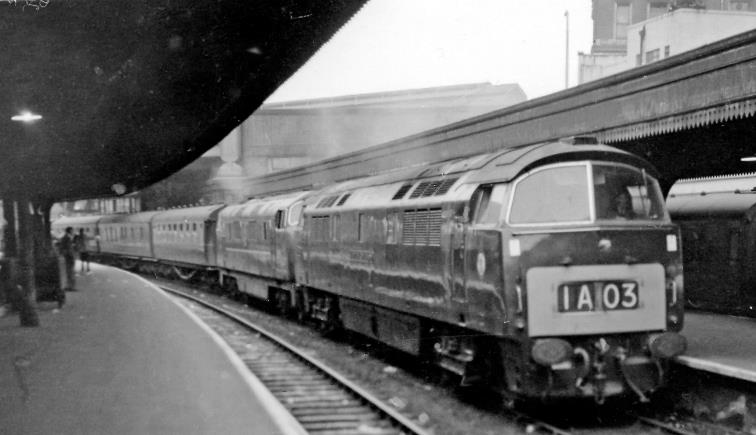 BloodandCustard
Paddington Station
Express from Cornwall arrives with two Diesel-Hydraulics
3rd August 1963
From Platform 8-9 at Paddington, the train, arriving at Platform 10 is probably the 12.30pm from Newquay, headed by 'Western' Type 4 C-C no.1054 'Western Governor' piloting 'Warship' Type 4 B-B no.D848 'Sultan'. 
 One of them - probably D1054 - had likely failed on the way .
  Ben Brooksbank (CC-by-SA/2.0)