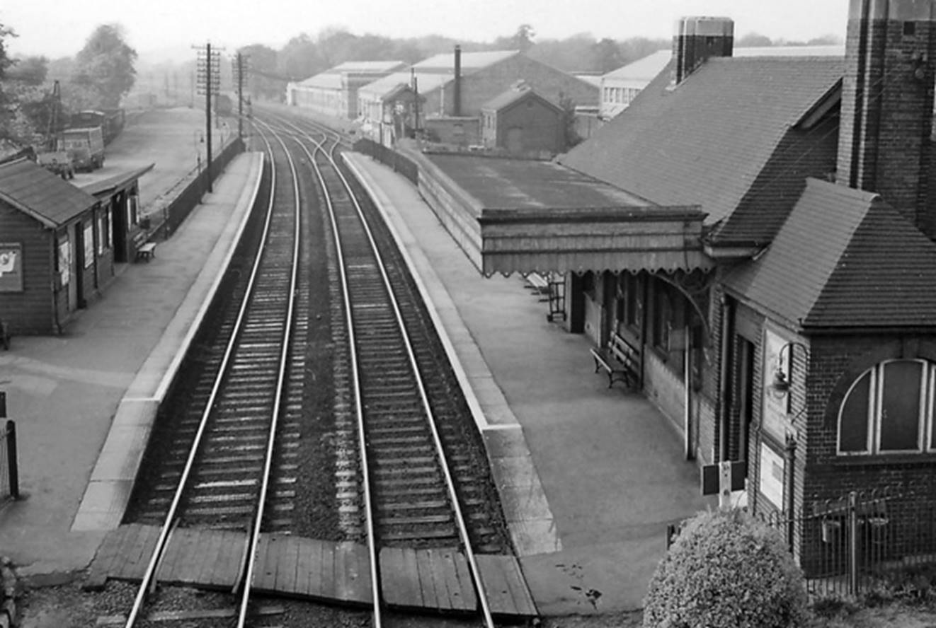 Bursledon 
View towards Fareham and Portsmouth (electrified since 1990). At top right can be seen the bridge carrying this line across the River Itchen (19th April 1963).
© Ben Brooksbank (CC-by-SA/2.0)
