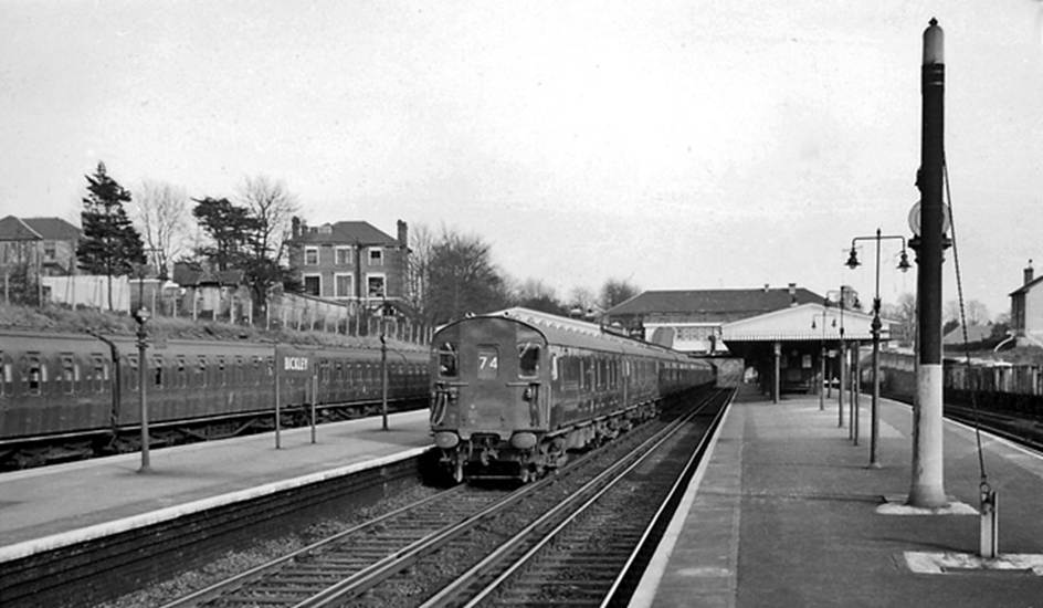 Bickley
View towards Swanley on 2nd March 1961.
An unidentified Phase 2 MLV leads a Dover Marine to Victoria headcode 74 Boat Train on the Up Chatham Slow. Note the Phase 2 MLVs dropped buckeye coupler.
 Ben Brooksbank (Geograph/CC-by-SA)
