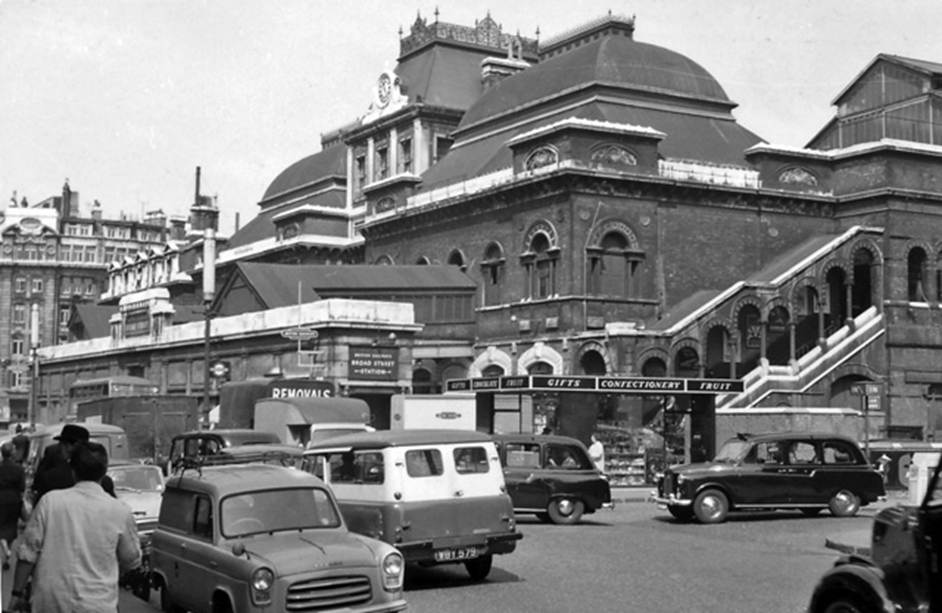 Broad Street
View from Liverpool Street of the ex-North London Railway City terminus of the DC-electrified suburban lines from Dalston Junction, Willesden Junction, Watford Junction (etc.), Richmond and (until May 1944) the line from Poplar. 
Broad Street Goods station was closed 27th January 1969/ After the last services had been diverted for a year into adjoining Liverpool St., Broad Street terminus and the lines from Dalston West Junction were closed completely on 30th June 1986.
  Ben Brooksbank (Geograph/CC-by-SA)