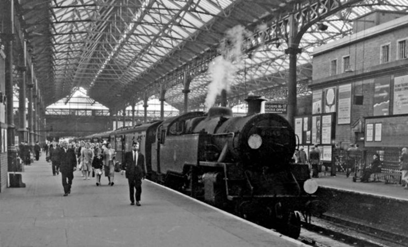 Victoria
From near to the barrier of Platforms 14 /15, a train from Tunbridge Wells West has just arrived at Victoria (Central Section) Station on Saturday, 13th May 1961.
Unlike all the other services into Victoria (Central Section) which were electrified before World War 2, the Oxted line trains remained steam-worked into the early sixties, often by 'imported' LMS-type and BR Standard classes. BR Standard 4MT no. 80148 was built at Brighton 29th November 1956 only to be withdrawn 14th June 1964.
 Ben Brooksbank (Geograph/CC-by-SA)
