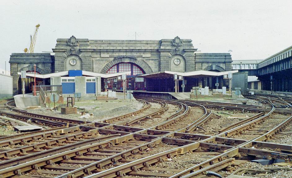 Train tracks leading to a building
Description automatically generated with low confidence