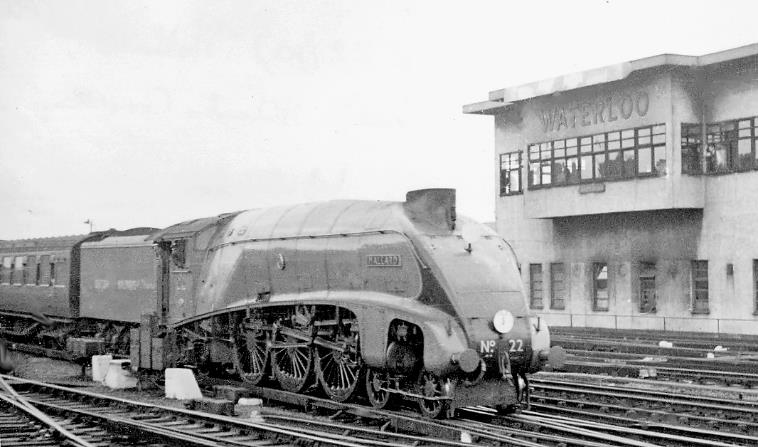'Mallard' enters Waterloo on the 'Atlantic Coast Express'
(1948 Locomotive Exchanges)
1st June 1948
The celebrated record-breaking LNER Gresley A4 class Pacific No. E22 'Mallard' (built March 1938, withdrawn April 1963 thence preserved) passes Waterloo Power Box as it arrives from Exeter, on a preliminary run without dynamometer car during the 1948 Locomotive Exchanges.
© Ben Brooksbank (CC-by-SA/2.0)

