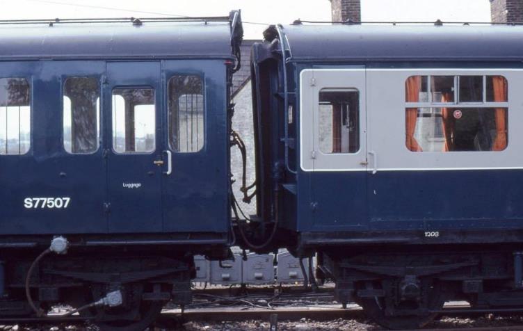 7th May 1979 and unit no.1203 at Redhill Up Siding (following the Inter-Village Express Tadpole railtour the previous day). This photograph shews the ex.EPB DTS speedometer drive, roller-bearing axle boxes, compression bar and Buckeye coupler along with modified jumper arrangements. 
The grills on the luggage compartment quarterlights are also visible along with Luggage on the doors. These three inner-end compartments were stripped internally into one large saloon for mail  all the heaters having been removed and metal cages placed over the lightbulbs to prevent damage from over-enthusiastic mail staff. 
The next two compartments (normally locked and labelled C1 & C2) were also used for mail but retained their seating for occasional passenger use. 
 John Atkinson
