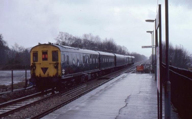 One of John Atkinsons favourite 'Tadpole' photos taken on Boxing Day, Tuesday 26th December 1978. This was probably the last year the Southern Region ran a meaningful Boxing Day service. The day was as cold and wet as it looks!
With passengers in coaches 2 & 3 only, 3R units nos.1206 + 1203 pull away from Edenbridge with a Redhill to Tonbridge train. It was formed of two units to reposition stock after being berthed 'under cover' at Selhurst on Christmas Day. Unit no.1203 subsequently returned on a Reading service having left unit no.1206 at Tonbridge. 
 John Atkinson
