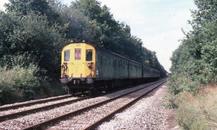 11.49 Tonbridge to Reading having just left Edenbridge on Monday 18th September 1978 with SWD 3H unit no.1110 leading 3R no.1205. Not an easy job for the driver as he needed to position the rear two coaches at some of the short platforms. 
 John Atkinson
