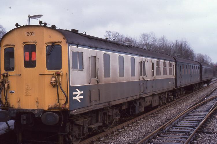Unit no.1202 pauses at Edenbridge with a Tonbridge-bound train on Boxing Day, Tuesday 26th December 1978 and is also in need of the attentions of the Carriage Cleaners at St Leonards. 
This unit had been at Selhurst over Christmas day, though no carriage cleaning would have been carried out that day. This was possibly the last year that Boxing Day trains ran over most of the SR network.
© John Atkinson
