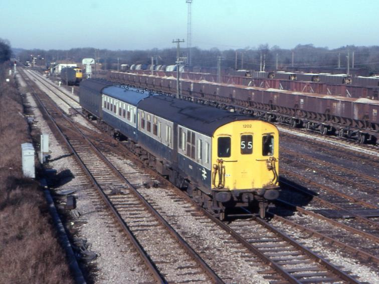 Slowing for Tonbridge station, unit no.1202 passes the busy Tonbridge West Yard on Friday, 23rd March 1979.
 Tony Watson
