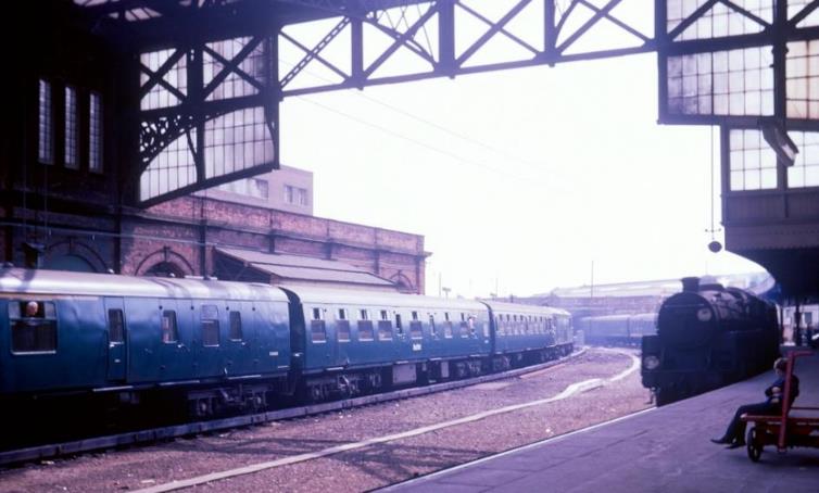 3rd June 1967 and the new and old order at Bournemouth Central with BR standard class 5 no.73085 arriving on the Down as an unidentified EDL leads 4 TB set no.422 on a Waterloo service. 
Into service at Sheffield from Crewe works in October 1954, no.73065 was allocated to the BR(S) in December 1962. No.73065 was withdrawn from Nine Elms (70A) a month after this photograph was taken.
3 TC set no.422 was made up to a 4 TB unit (with S70805 & S69323) in April 1967. Just four days after this photograph these two coaches were placed into 4 REP 3005 and 422 reverted to a 3 TC until 7th July 1967.
© Jon Stubley
