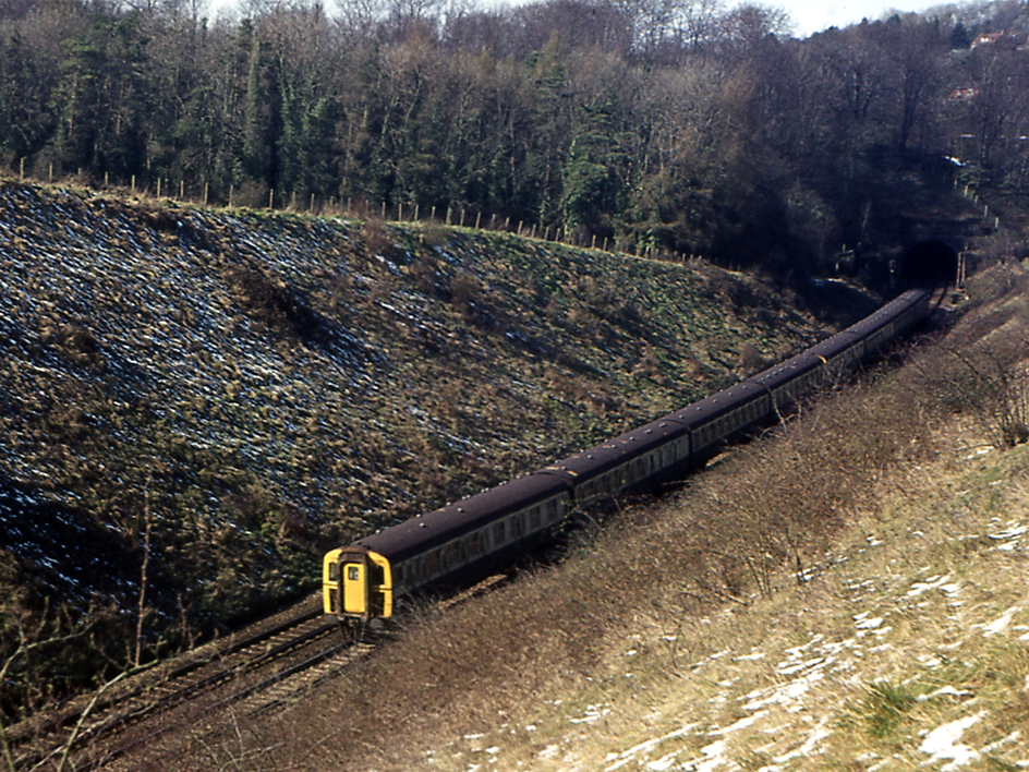 https://www.bloodandcustard.com/BR-4VEP.html
Having just exited Quarry Tunnel, an unidentified pair of 4 VEP units are about to pass under Rockshaw Road. These units are operating the ‘old-style’ Gatwick shuttle (headcode 10 – via the Quarry Line) on Good Friday, 28th March 1975.