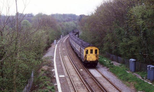 https://www.bloodandcustard.com/BR-6S-6L-6B-Hastings.html
Passing the new cabinets for the 11Kv feeder cables close to Vauxhall Lane overbridge, unit no.1012 (with no.1001 on the rear) is braking for the speed restriction into Somerhill Tunnel.
“Following the ‘drama’ with unit no.1017 I did not have long to wait for no.1012, Driver Russell and passenger Colin Price!”
John Atkinson ©