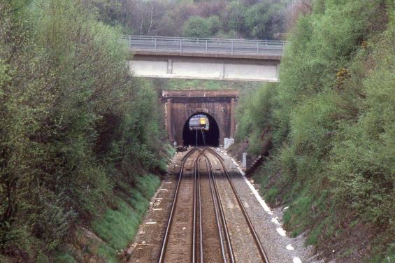 https://www.bloodandcustard.com/BR-6S-6L-6B-Hastings.html
With clear line of sight through Somerhill Tunnel unit no.1017 (with no.1011 on the rear) is making hard work of the 1 in 48!
© John Atkinson