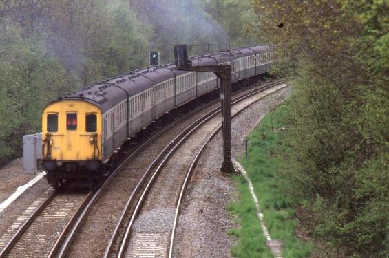 https://www.bloodandcustard.com/BR-6S-6L-6B-Hastings.html
With all four engines working hard, unit no.1011 assists no.1017 on the continuing climb to Tunbridge Wells Tunnel Jcn.
© John Atkinson