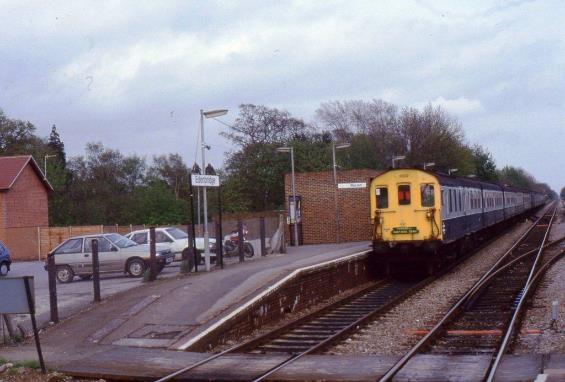 https://www.bloodandcustard.com/BR-6S-6L-6B-Hastings.html
On the rear of the ‘Hastings DEMU Farewell” tour unit no.1002 passes through Edenbridge en-route to Charing Cross routed via Tonbridge, Ashford, Rye, Tonbridge and Hastings.
“From Hildenborough (13.45 ex.Charing Cross) I rode across to Edenbridge, a brew with my parents thence the tour train”.
“Bought three years earlier in 1983, I still own my trusty red & white CBX 550 motorcycle parked in the car park – this has now been ‘in-service’ for longer than the Hastings DEMUS!”
John Atkinson ©