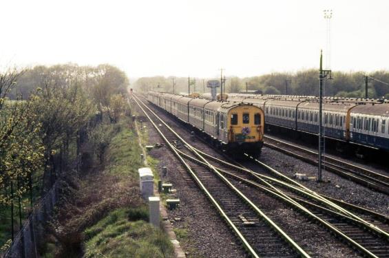https://www.bloodandcustard.com/BR-6S-6L-6B-Hastings.html
The excursion (units no.1032 & 1002) returns to Tonbridge alongside lines of stabled BR-type 4 CAP & 2 EPB units.
“Upon arrival at Tonbridge I walked round to the West yard bridge to see the Farewell tour come down the Redhill line; seem to recall they ran in about the same time as no.1011 working down on 16.45 Charing Cross to Hastings”.
Colin Price ©