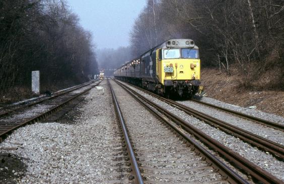 https://www.bloodandcustard.com/BR-6S-6L-6B-Hastings.html
The first Restriction 4 (C1) gauge passenger train to traverse the route was Mk1 stock hauled by 50 025 ‘Invincible’.
“This locomotive-hauled train was photographed from the public foot crossing just south of Wadhurst’s Up Siding”.
Colin Price ©