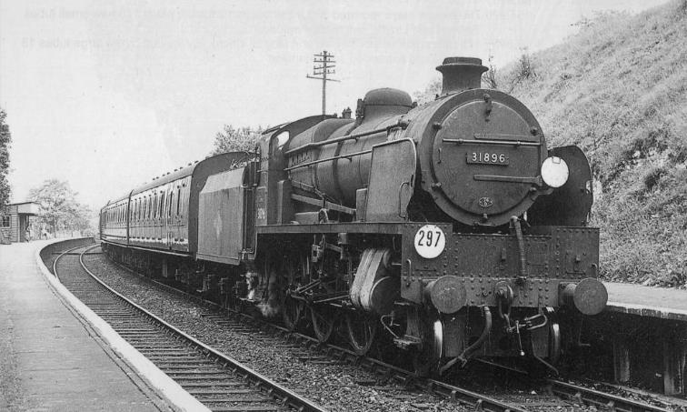 BloodandCustard BR(S) Mk1 Non-corridor Stock Southern Region Southern Suburban
U1-class locomotive 31896 enters Riddlesdown station hauling set 904 on a London Bridge to Tunbridge Wells West service c.1958. Just visible is the rebuilt 48’ LSWR composite S4727S (third coach in this Crimson Lake liveried set); this coach was removed from the set 15th September 1958 and replaced by two Bullied CK coaches.
©Irwell Press (Mike King collection)
