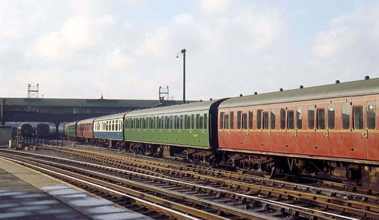 BloodandCustard BR(S) Mk1 Non-corridor Stock Southern Region Southern Suburban
Mixture of vehicles being shunted at Clapham Yard including lined maroon Second, green Second, blue /grey BSK, lined Maroon FK & possibly Bulleid stock (July 1967).
© Glen Woods collection /Bluebell Railway Museum
