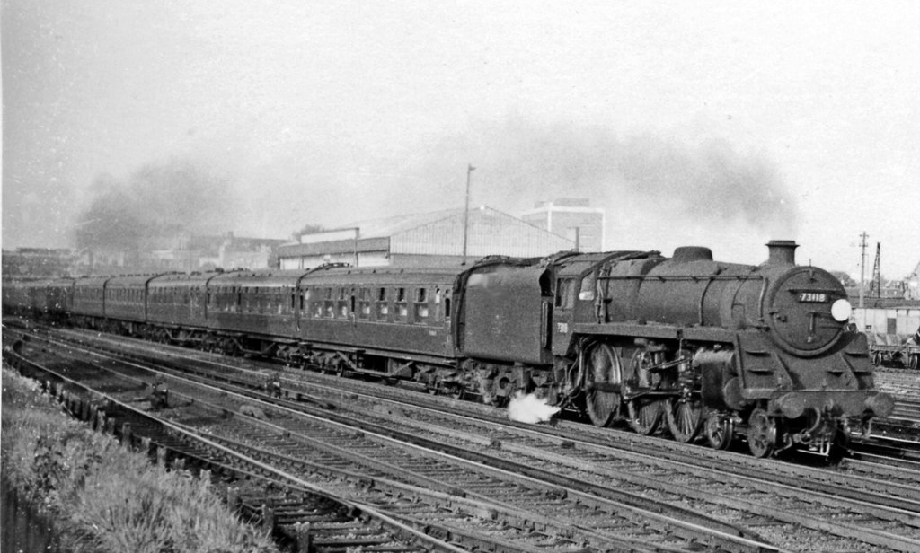 BloodandCustard BR(S) Mk1 Non-corridor Stock Southern Region Southern Suburban
Non-corridor stock in Waterloo to Basingstoke semi-fast service
With non-corridor stock towards the middle of the formation (4th coach-on), Waterloo to Basingstoke semi-fast service is about to pass under King Charles Road bridge (near Wimbledon) hauled by BR Standard 4MT no. 76059 on Thursday, 4th June 1964.
 Ben Brooksbank (Geograph/CC-by-SA)

