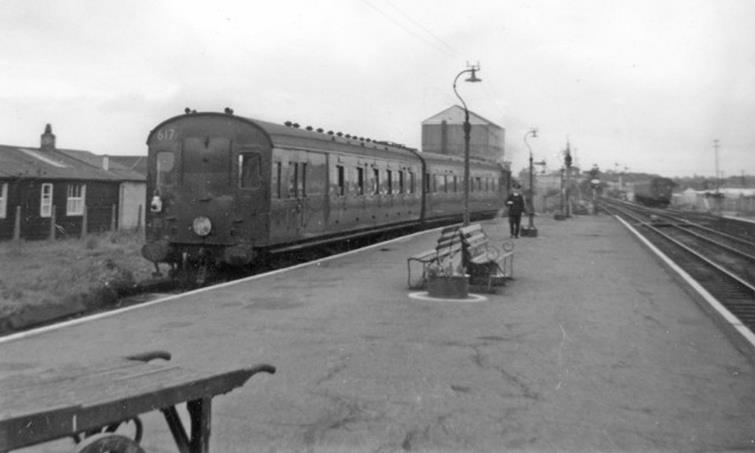 Southern Region
Pull-Push Sets
(Maunsell rebuilds 600-619)
Sporting air-horns, set 617 on a Swanage train at Wareham, Thursday, 15th August 1963. In the background, a ‘spare’ pull-push sits against the ‘stops’ in the up siding.
Note both tail lamp & headcode disc, a not uncommon practice on branch lines.
“The push-pull train for Swanage, headed by an LSWR M7 0-4-4T, was the object of my trip from Weymouth, where we were on holiday” [John Sutton]. 
© John Sutton (CC-by-SA/2.0)
