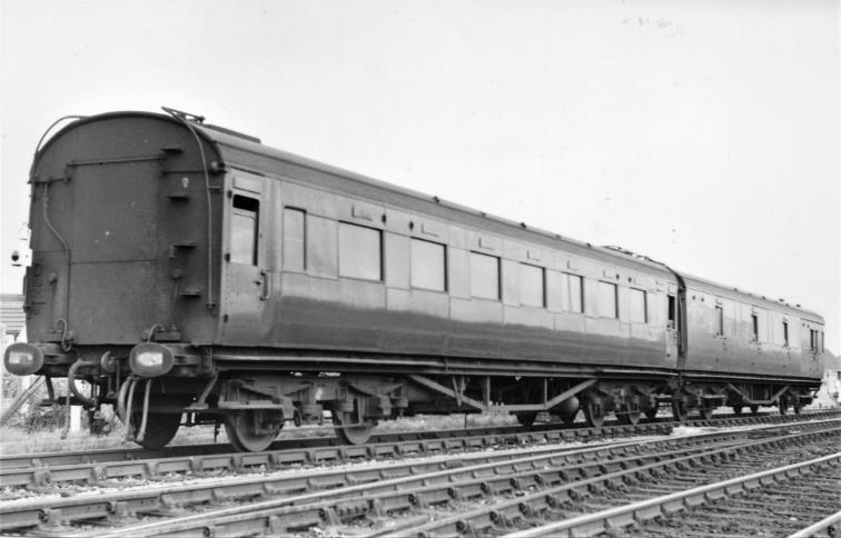 Southern Region
Pull-Push Sets
(Maunsell rebuilds 600-619)
Set 616 at Wareham on Saturday, 18th September 1964, now being used as a loco-hauled pair. The Spencer-Moulton buffers on SO S1319 can be clearly seen along with the former gangway (now plated over).
The UIC yellow First-class band on the BCK is barely visible but there.
 A.E. West (Mike King collection)
