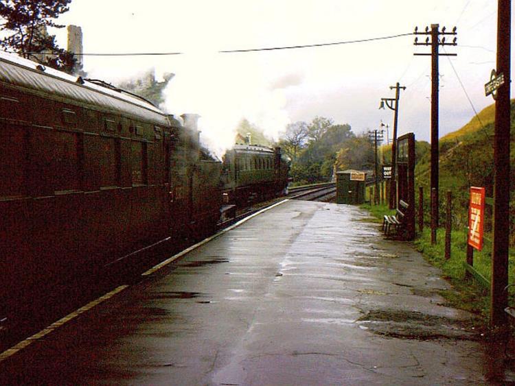 Southern Region
Pull-Push Sets
(Maunsell rebuilds 600-619)
With the ruins of Corfe Castle just visible, two push-pull trains (each with a M7 locomotive) pass at Corfe Castle station on Saturday, 9th November 1963.
 Richard Green (CC-by-SA/2.0)
