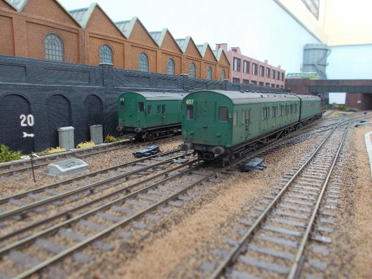 Southern Region
Pull-Push Sets
(Maunsell rebuilds 600-619)
Hornby pull-push sets 619 & 610 on Ewhurst Green model railway; both weathered by TMC the latter renumbered to set 607 which met it end at Eastbourne in 1962.
 Colin Watts
