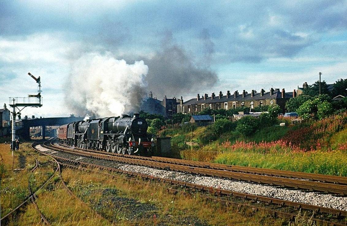 The Fifteen Guinea Special passing Spring Vale on Sunday, 11th August 1968 At the time this was British Rail’s last main line steam train, the Fifteen Guinea Special running from Liverpool to Carlisle via Manchester returning via the Settle and Carlisle line. On the leg from Carlisle to Manchester the train was hauled by Stanier Black 5 locos 44871 and 44781.
© Alan Murray-Rust (Geograph)
