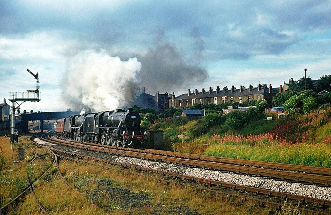 The Fifteen Guinea Special passing Spring Vale on Sunday, 11th August 1968 At the time this was British Rails last main line steam train, the Fifteen Guinea Special running from Liverpool to Carlisle via Manchester returning via the Settle and Carlisle line. On the leg from Carlisle to Manchester the train was hauled by Stanier Black 5 locos 44871 and 44781.
 Alan Murray-Rust (Geograph)
