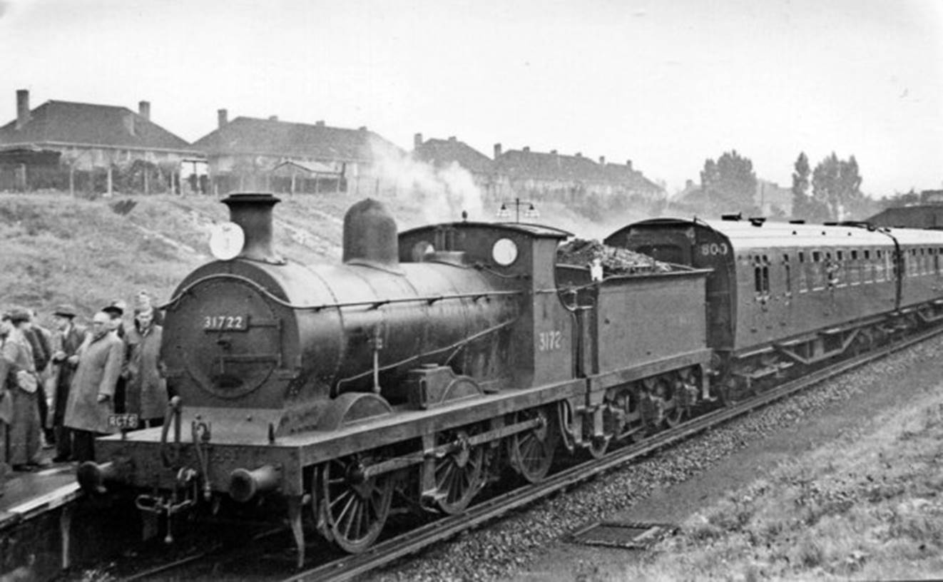 St. Helier 
RCTS South London Rail Tour
View towards Wimbledon on 30th September 1950 and the Railway Correspondence & Travel Society South London Rail Tour. Both line and station were opened as on 5th January 1930, with an electric service from Holborn Viaduct via Tulse Hill, Streatham and Wimbledon to Sutton. Behind the locomotive is Malachite-livery Bulleid 3 Cor set formed 12th July 1948. “It was a memorable Tour, covering numerous unfamiliar sections of the network in South London”.
© Ben Brooksbank (CC-by-SA/2.0)
