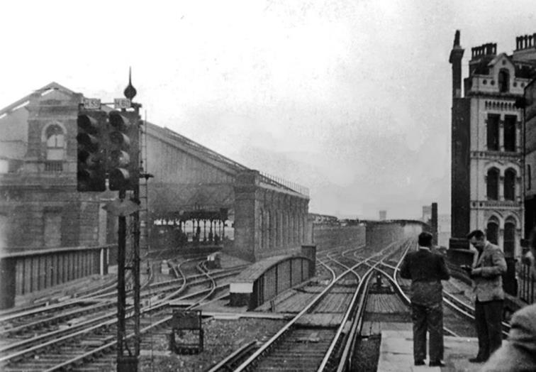 Blackfriars 
RCTS Railtour
10th October 1953
On the day of an RCTS Rail Tour. South from the platform of former Ludgate Hill Station (closed 3rd Match 1929), towards Blackfriars Station, showing SR Through lines from Holborn Viaduct Station and on right the separate 'Metropolitan Widenend Lines' (used for freight traffic) over the Blackfriars Bridges towards Elephant & Castle. 
© Ben Brooksbank (CC-by-SA/2.0)
