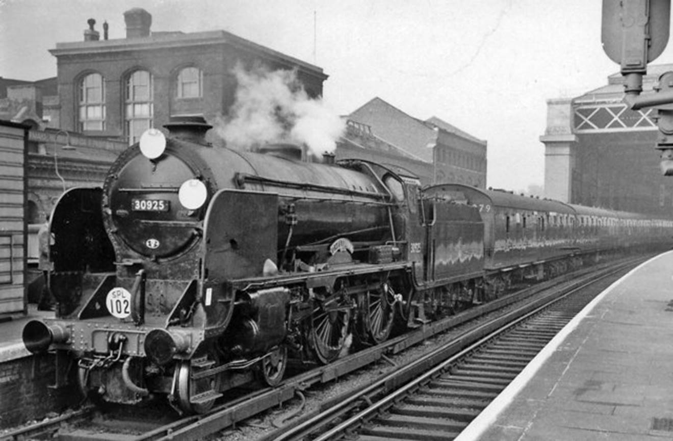 London Bridge (Central) 
RCTS 'Sussex Rail Tour'
London Bridge (Central) Station on 7th October 1962, with 'Schools' no. 30925 'Cheltenham' (built April 1934) with Mk1 set 279 ready to leave at 11.03am on the Railway Correspondence & Travel Society 'Sussex Rail Tour', which went to Brighton by the main line thence Seaford and back to Brighton, returning to London Bridge via Preston Park (rev), Hove, Steyning, Horsham and Sutton. 'Cheltenham' was withdrawn soon after (December 1962) but was fortunately preserved.
 Ben Brooksbank (CC-by-SA/2.0)
