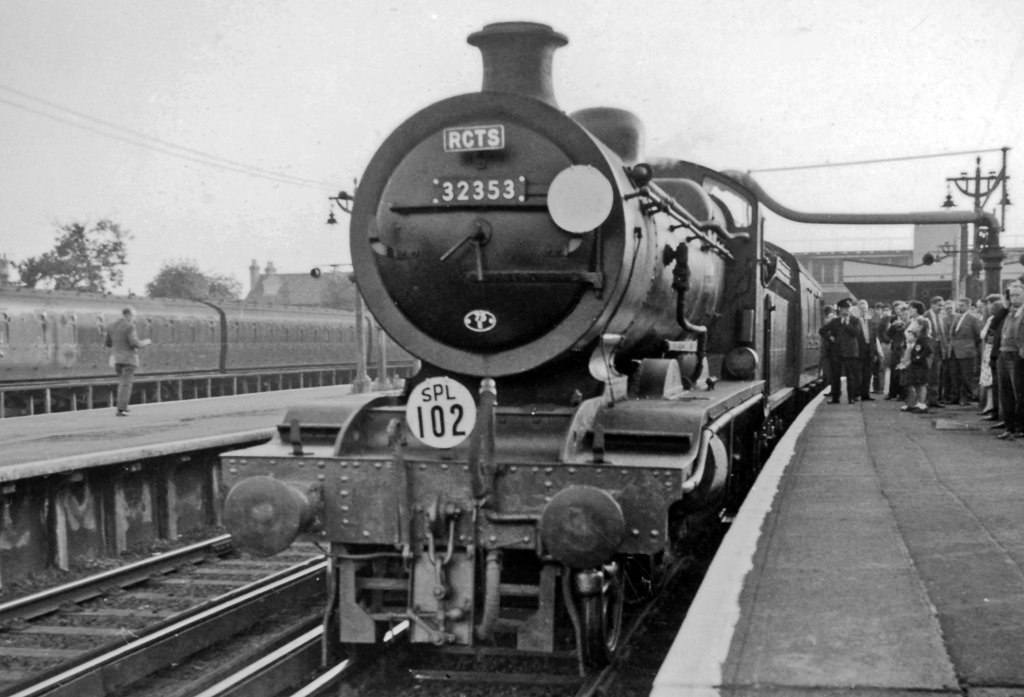 Derby
RCTS /LCGB The North Midlands Rail Tour
“This is a poor photograph, but merits exposure for the almost unknown appearance at the time of a 'West Country' 4-6-2 right up at Derby, in the Locomotive Yard of that Midland stronghold”. 
Taking water between bringing a memorable RCTS Tour on 11th May 1963 from London St Pancras by the main line via Leicester. After resting the locomotive went light to Burton-on-Trent where it re-joined the Tour and took it back to London via Coalville and Knighton South Junction near Leicester.
In the meantime, the party visited Derby Shed then re-joined the Special for a great circuit (behind ex-LNER B1 no.61004), via Trent, Pye Hill, and Ambergate to Buxton, then down to Ashbourne and Uttoxeter, and back towards Derby but turning off at Tutbury to Burton-on-Trent. 
With extended smoke deflectors, 'West Country' no.34006 'Bude' was built July 1945 as no.21C106, renumbered by BR as 34006 but was never rebuilt before withdrawal March 1967 and scrapping.
© Ben Brooksbank (CC-by-SA/2.0)
