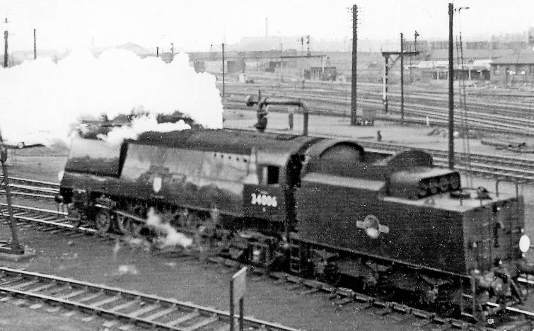 Derby
RCTS /LCGB The North Midlands Rail Tour
This is a poor photograph, but merits exposure for the almost unknown appearance at the time of a 'West Country' 4-6-2 right up at Derby, in the Locomotive Yard of that Midland stronghold. 
Taking water between bringing a memorable RCTS Tour on 11th May 1963 from London St Pancras by the main line via Leicester. After resting the locomotive went light to Burton-on-Trent where it re-joined the Tour and took it back to London via Coalville and Knighton South Junction near Leicester.
In the meantime, the party visited Derby Shed then re-joined the Special for a great circuit (behind ex-LNER B1 no.61004), via Trent, Pye Hill, and Ambergate to Buxton, then down to Ashbourne and Uttoxeter, and back towards Derby but turning off at Tutbury to Burton-on-Trent. 
With extended smoke deflectors, 'West Country' no.34006 'Bude' was built July 1945 as no.21C106, renumbered by BR as 34006 but was never rebuilt before withdrawal March 1967 and scrapping.
 Ben Brooksbank (CC-by-SA/2.0)
