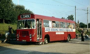 A red bus on the street

Description automatically generated with medium confidence