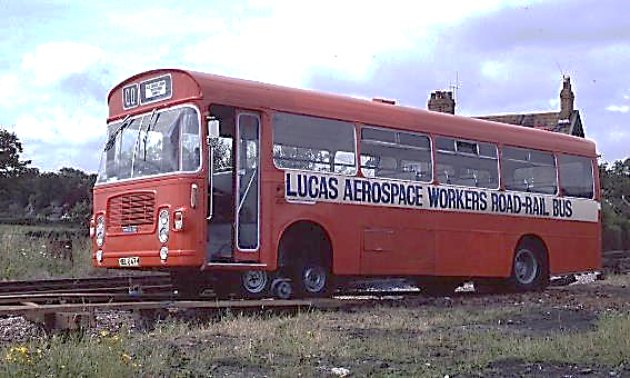 A red bus on the tracks

Description automatically generated with low confidence