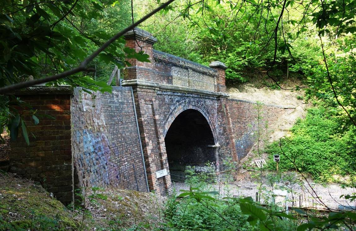 https://www.bloodandcustard.com/BR-Tunnels-MarkBeech.html

The tunnels south-end portal, parapet and wing-walls.
 Des Blenkinsopp (CC by SA/2.0)
