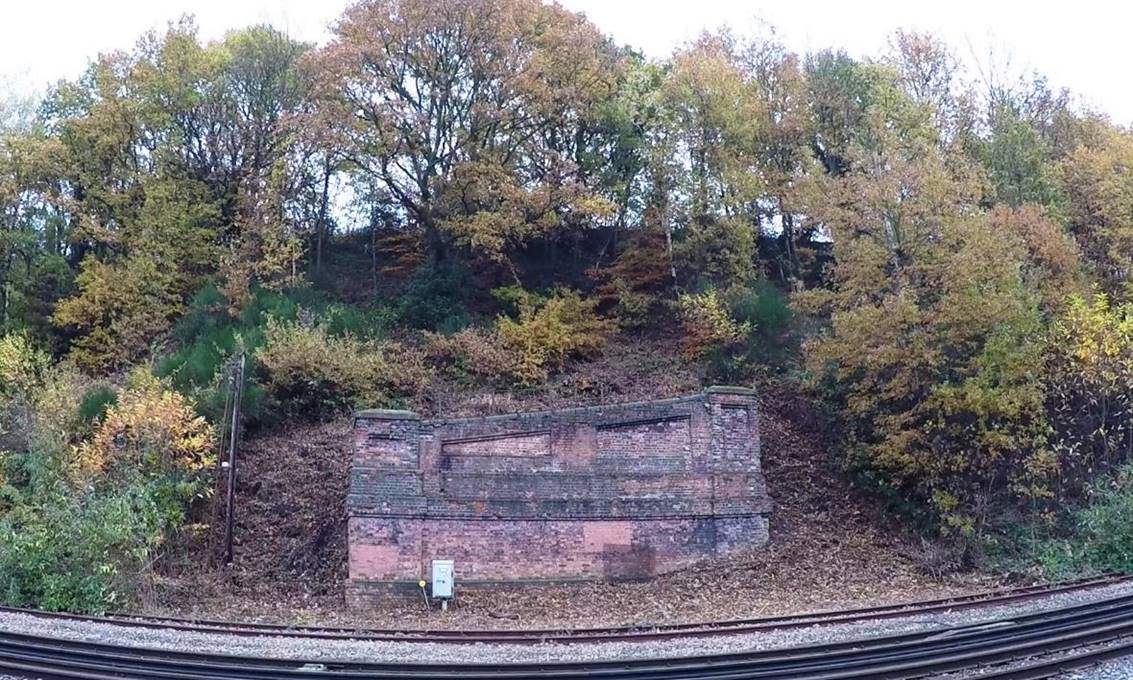 www.BloodandCustard.com

Looking across the Redhill (left) to Tonbridge (right) 
railway line to the brick facia of the slit vent. 
 Adrian Backshall
